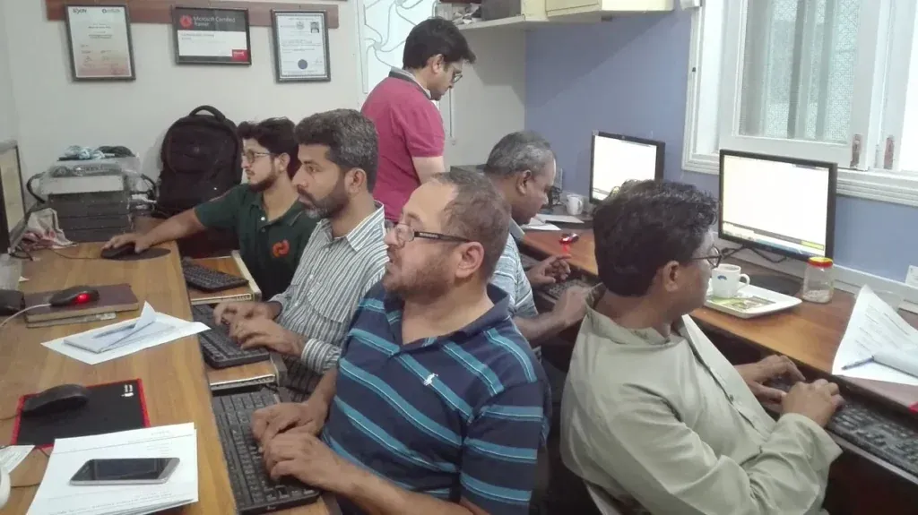 Early students working at computers, Sherdil IT Academy 2017