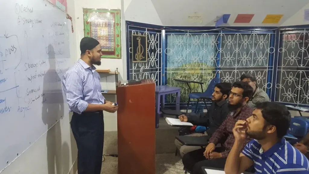 Instructor explaining a diagram to students, Sherdil IT Academy 2017