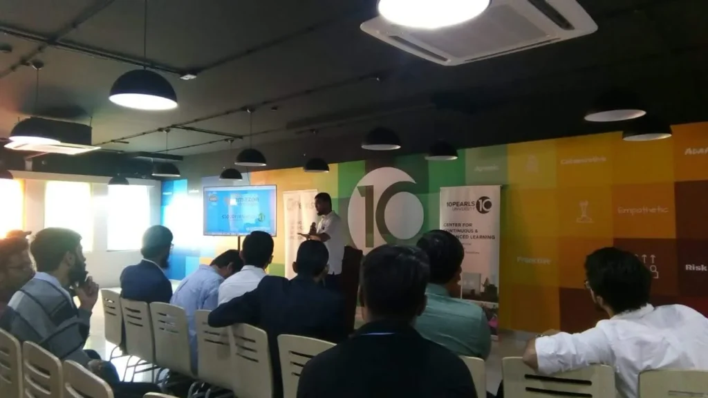 Audience at an early Sherdil session in a corporate training hall, 2017