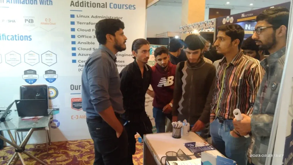 Group of students at the Sherdil vendor certifications booth, ITCN Asia 2023
