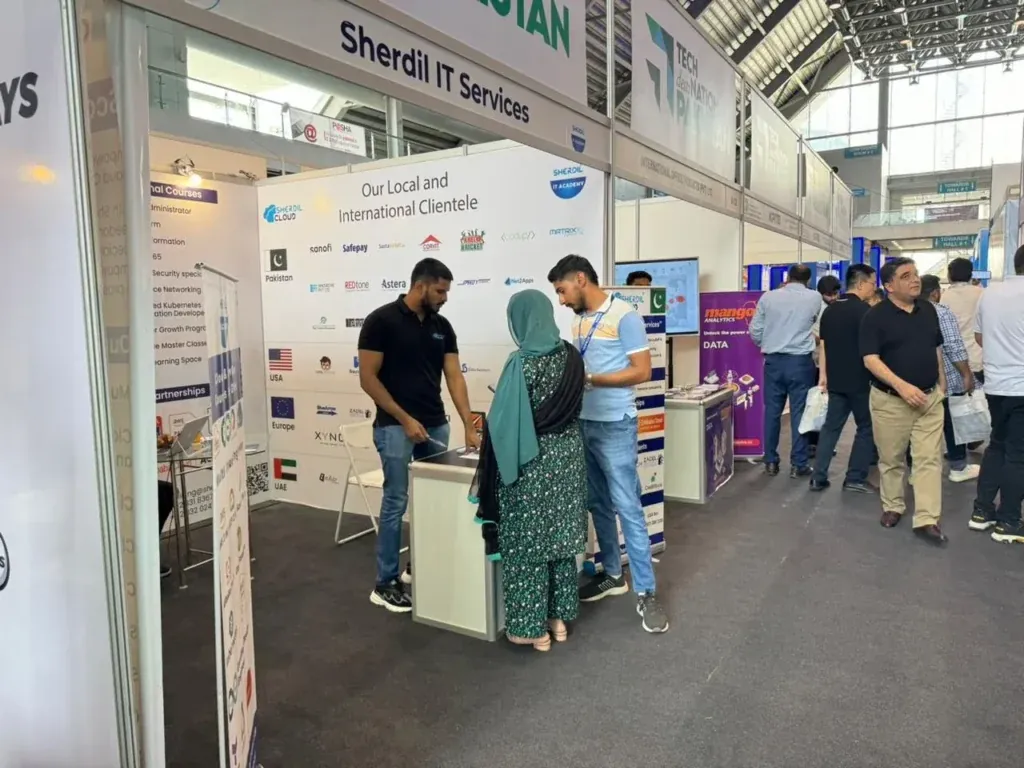 Visitors at the Sherdil IT Services booth, ITCN Asia 2024 Lahore