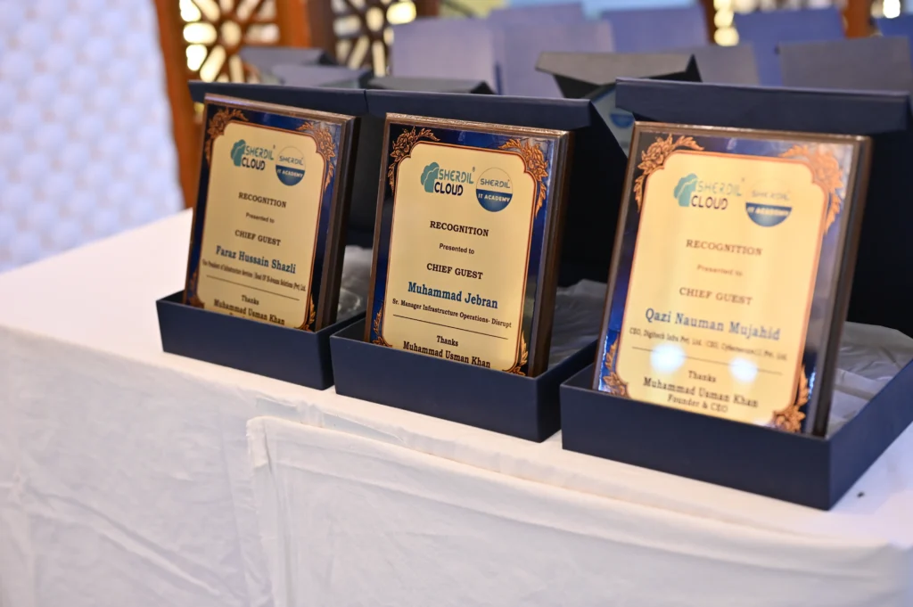 Award plaques displayed on a table, Sherdil 7th anniversary meetup 2024