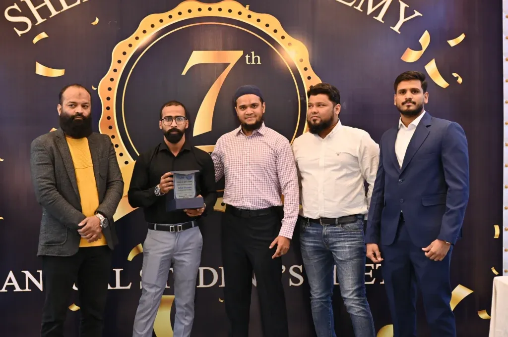Group of award recipients on stage, Sherdil 7th Anniversary Meetup 2024