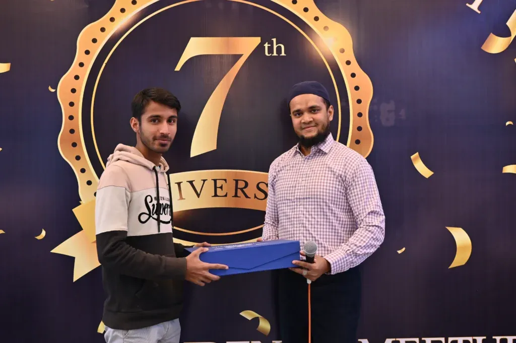 Student receiving a prize at the Sherdil Annual Students Meetup 2024