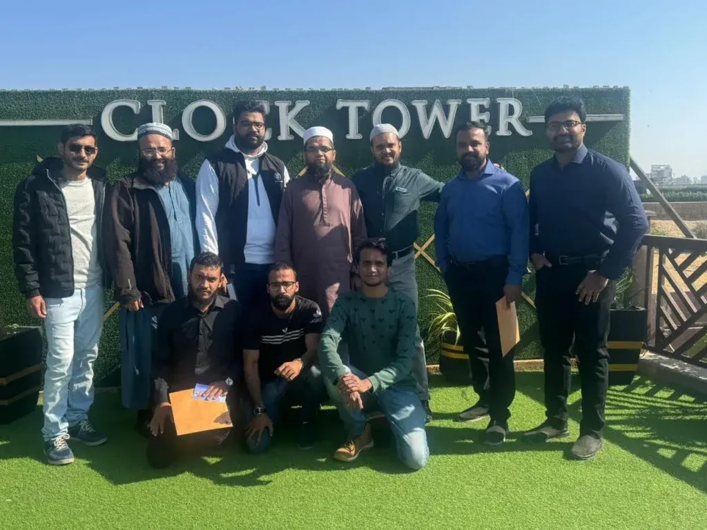 Group photo of the Sherdil team on the Clock Tower rooftop, 2024