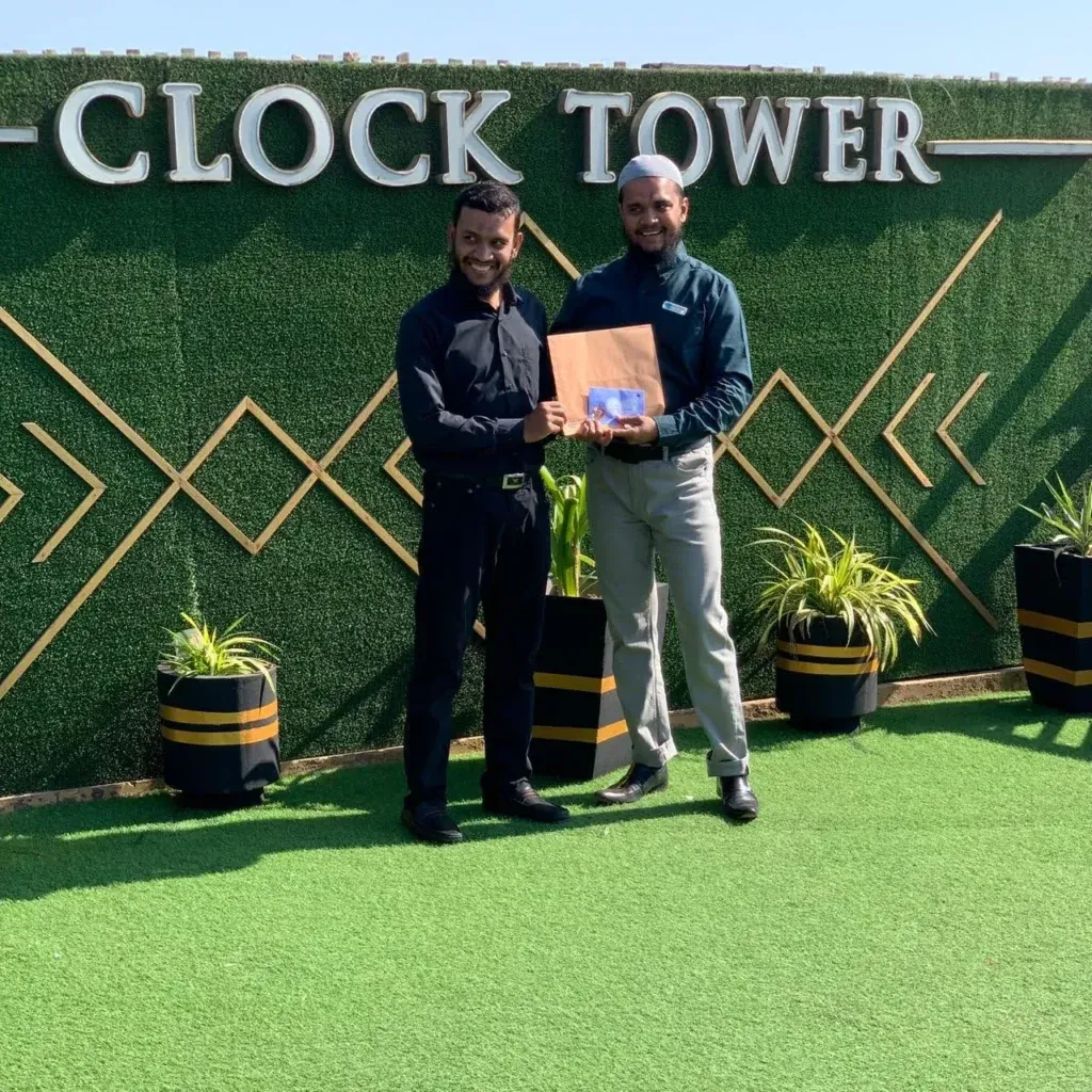 Team member receiving an award at the Sherdil Annual Lunch and Award Distribution 2024