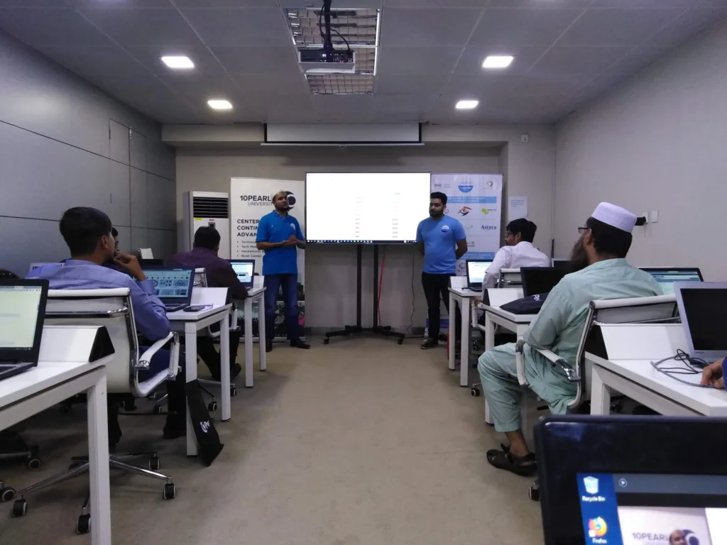 Instructor leading the AWS session in a training room, 10Pearls 2019
