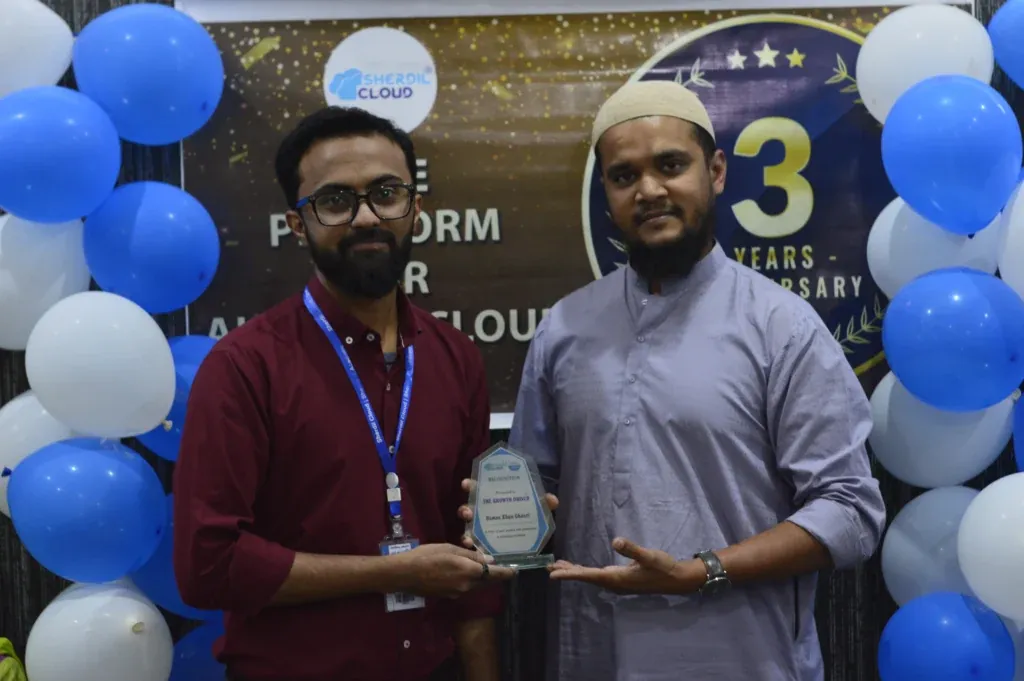 Award recipient with a Sherdil team lead, Annual Dinner 2022