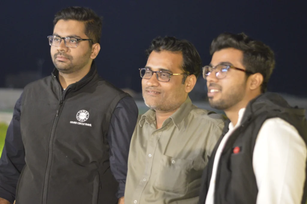 Three guests smiling at the Sherdil Annual Dinner 2022