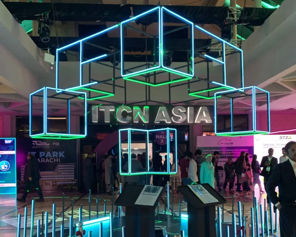 ITCN Asia 2025 entrance with a neon cube installation, Karachi
