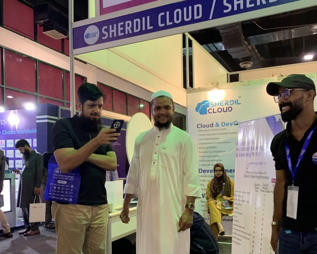 Sherdil Cloud booth with team members and visitors, ITCN Asia 2025