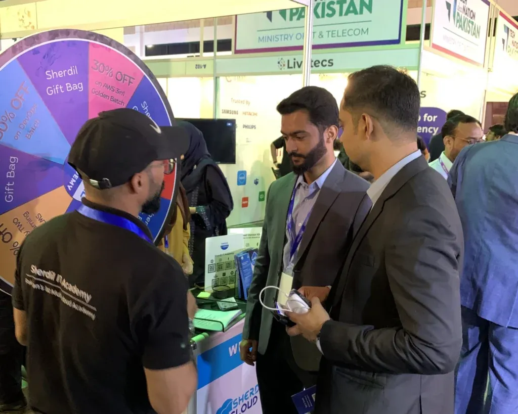 Visitors at the Sherdil gift wheel, ITCN Asia 2025 Karachi