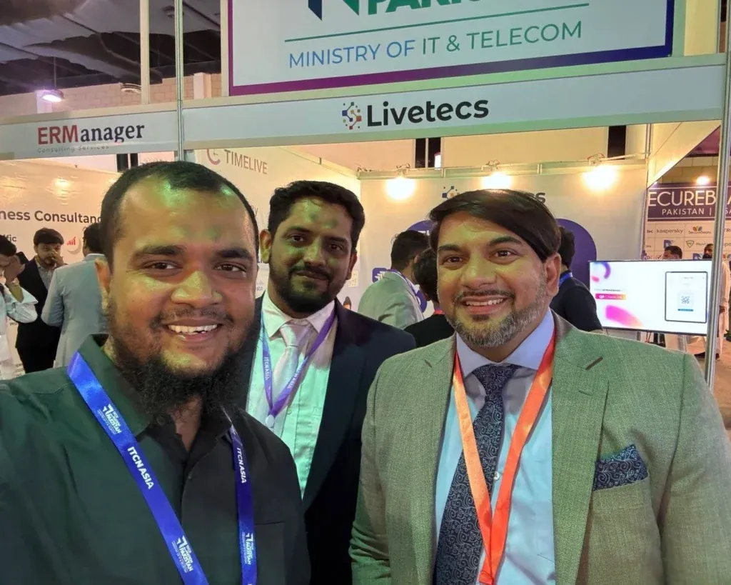 Selfie of the Sherdil team with a guest at the booth, ITCN Asia 2025
