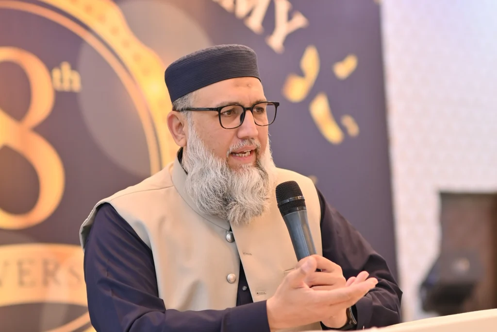 Speaker addressing the audience at the Sherdil 8th Anniversary Meetup 2025