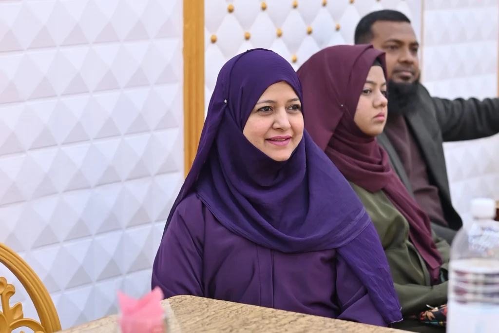 Smiling attendee at the Sherdil IT Academy 8th anniversary meetup, 2025