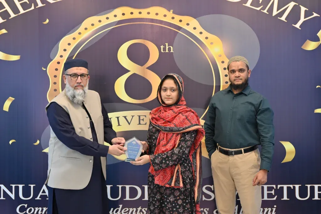 Female student receiving an award at the Sherdil Annual Students Meetup 2025