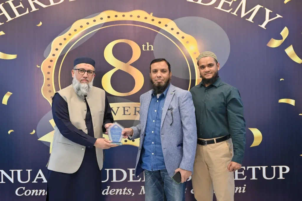 Alumnus receiving a recognition shield, Sherdil 8th Anniversary Meetup 2025