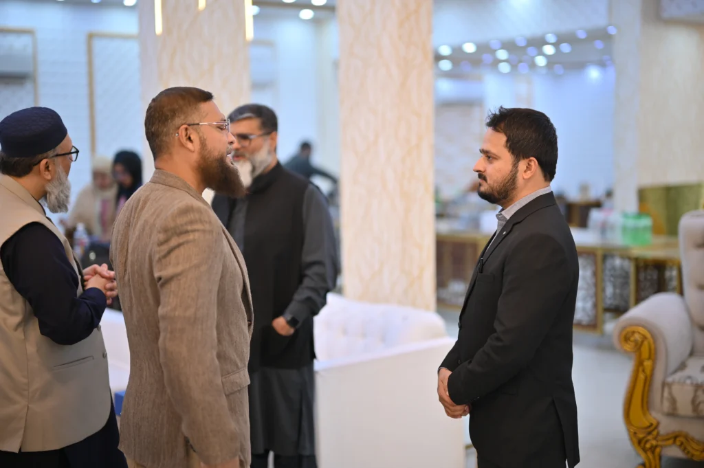 Guests talking at the venue of the Sherdil 8th anniversary meetup, 2025