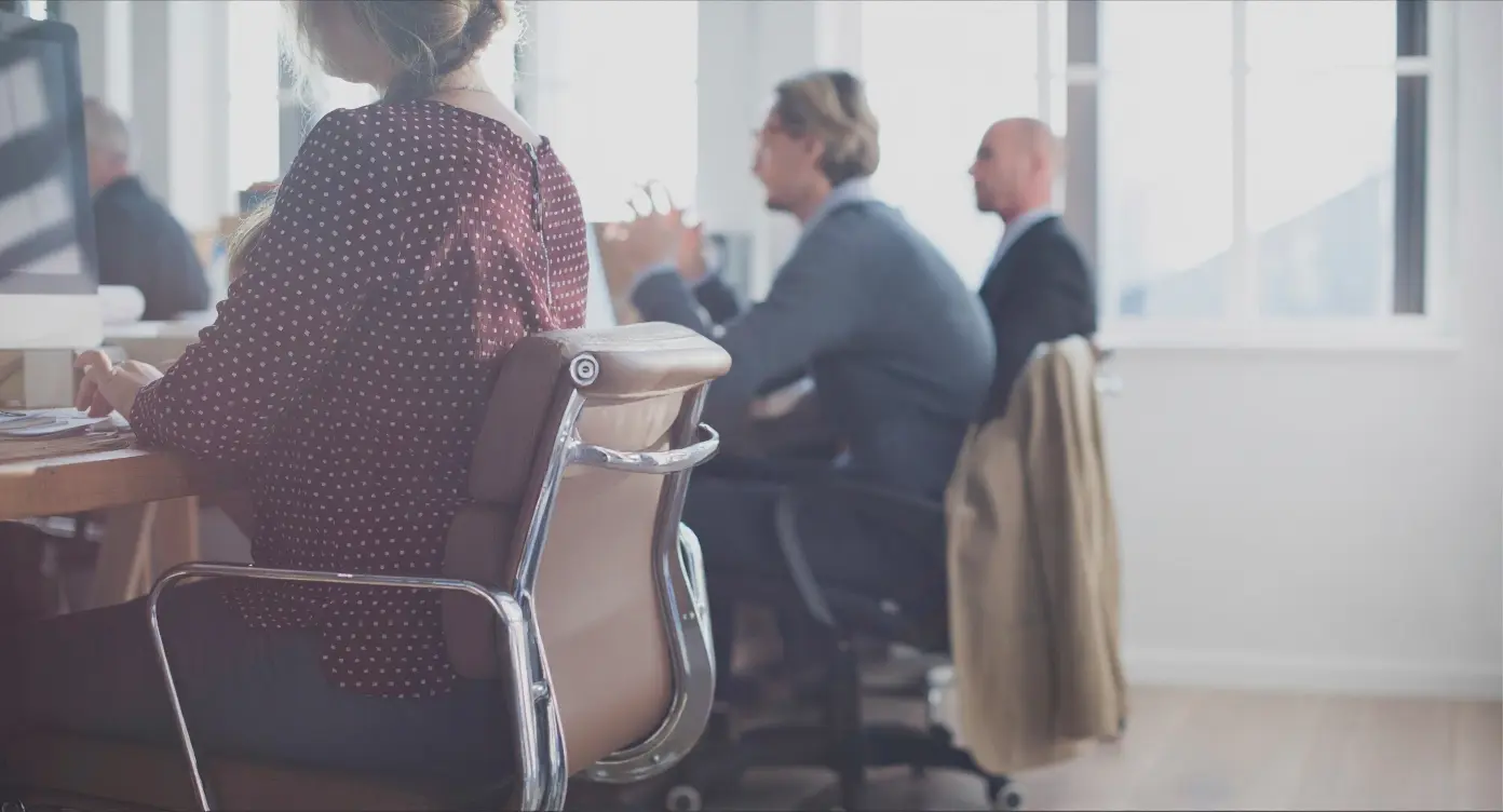 Professionals collaborating in a modern office environment, representing the growing DevOps career opportunities in Pakistan in 2026.
