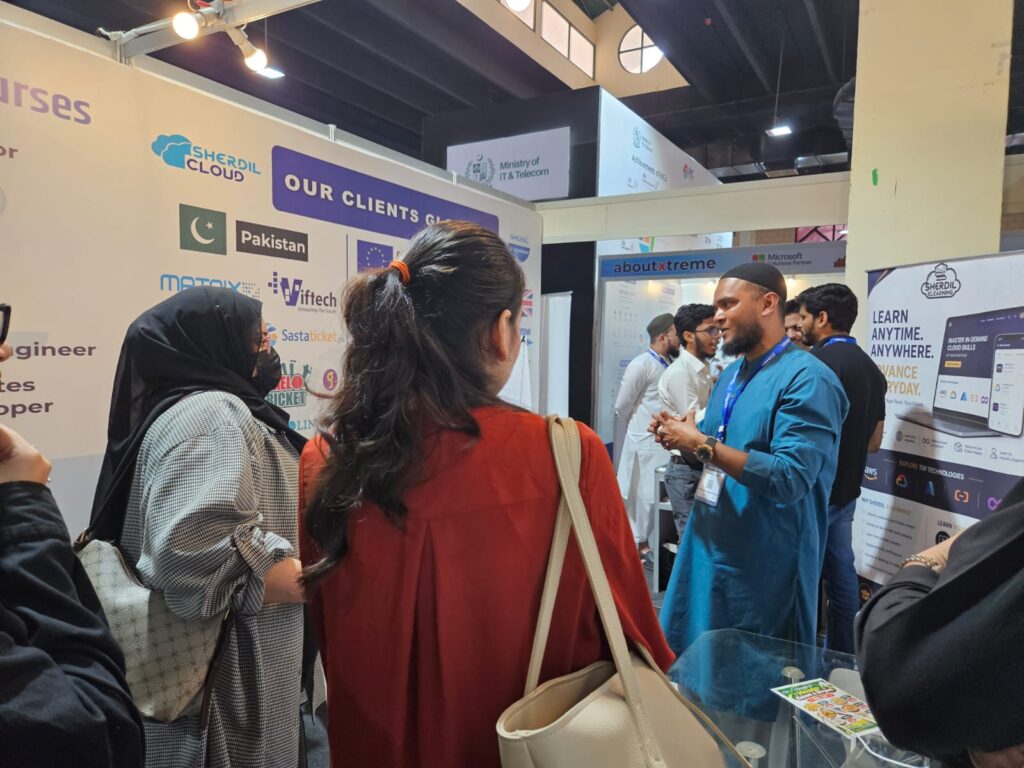 Visitors in front of the Our Clients Globally wall at the Sherdil booth, ITCN Asia 2026