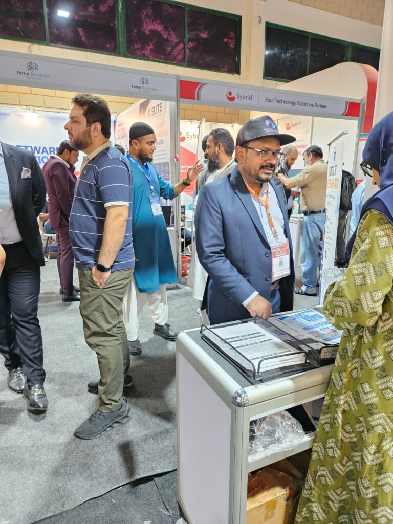 Visitors at the Sherdil booth desk, ITCN Asia 2026 Karachi