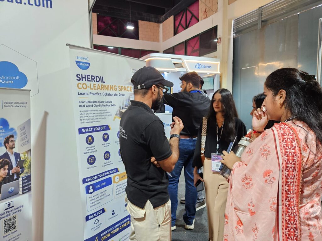 Visitors beside the Sherdil Co-learning Space banner, ITCN Asia 2026 Karachi