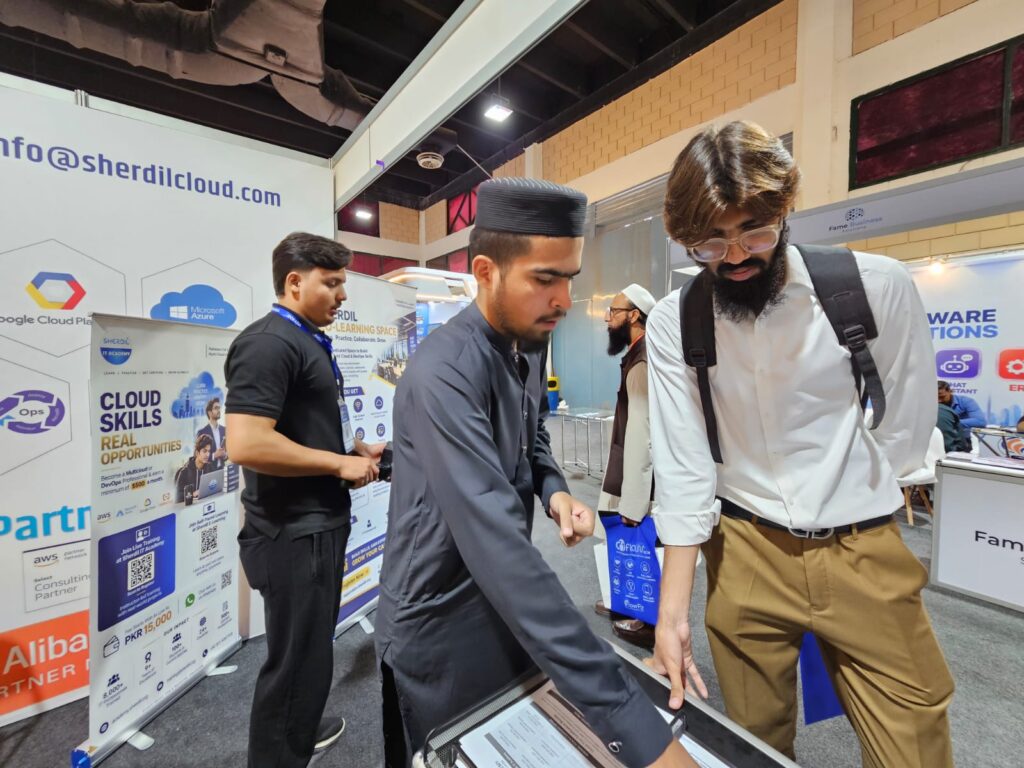 Sherdil team explaining cloud skills programmes to a visitor, ITCN Asia 2026