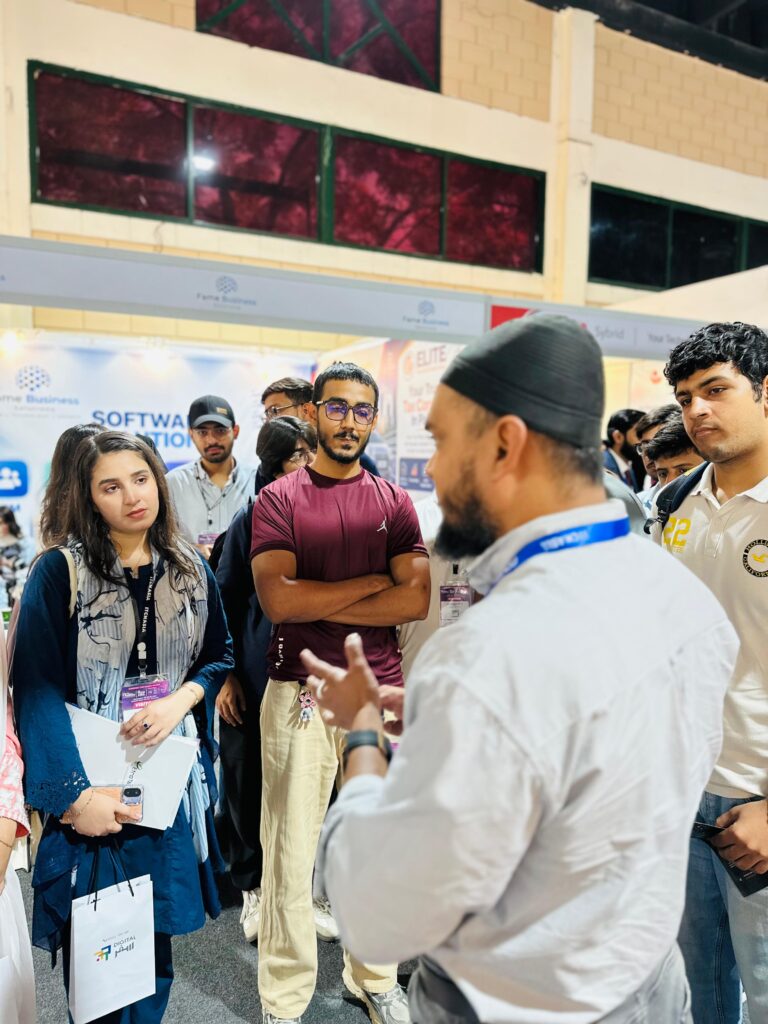 Students with event badges at the Sherdil booth, ITCN Asia 2026